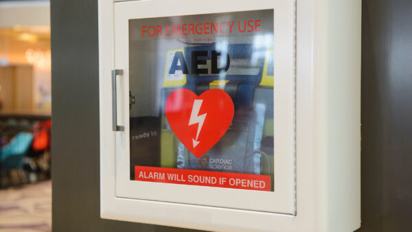 Defibrilator behind a glass door