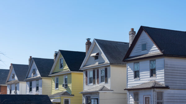 Row of Old Wood Homes on a street.