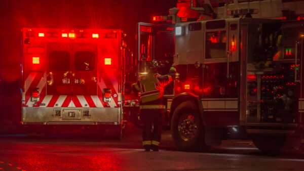 fire truck, firefighter, ambulance responding to car crash at night