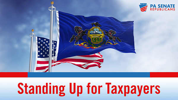 American flag flying behind the Pennsylvania flag with the words Standing Up for Taxpayers underneath