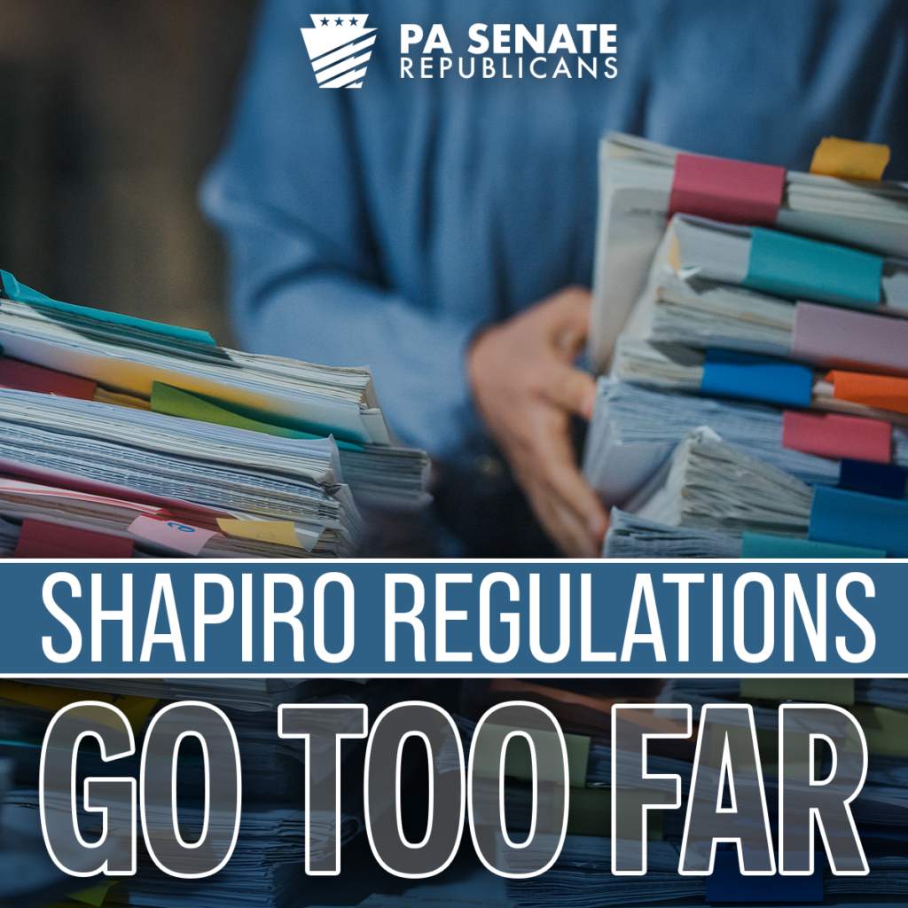Shapiro Regulations GO TOO FAR in the foreground with stacks of paper and a person blurred in the background.