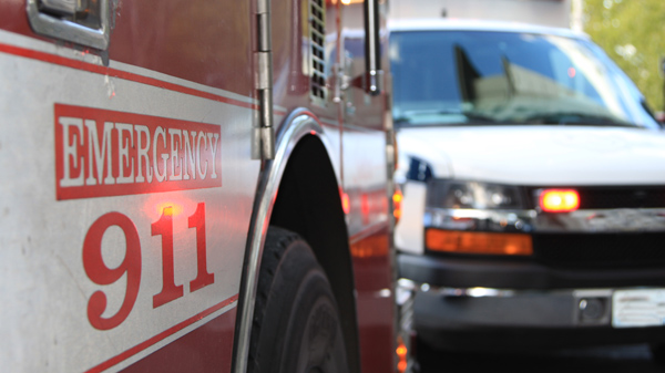 This is an emergency scene including both a fire engine and an ambulance.